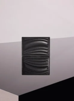 MUGLER black embossed spiral cardholder