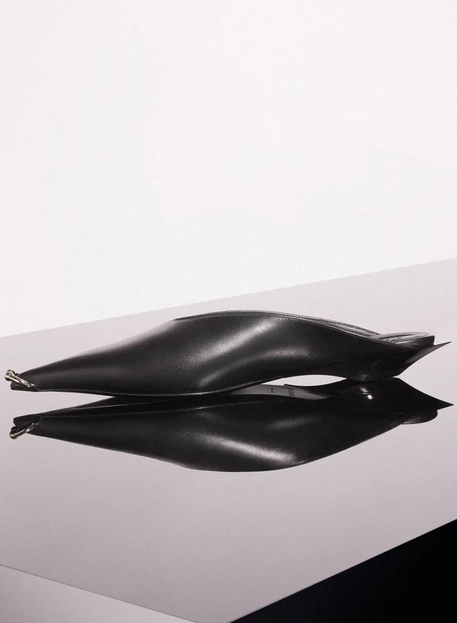 MUGLER black leather piercing fang flat mules